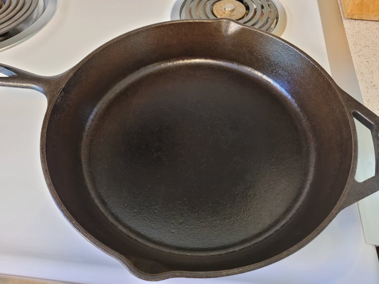 Thin layer of oil applied to cast iron skillet