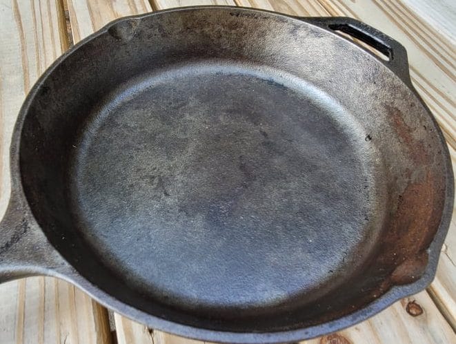 Poorly seasoned, patchy cast iron skillet