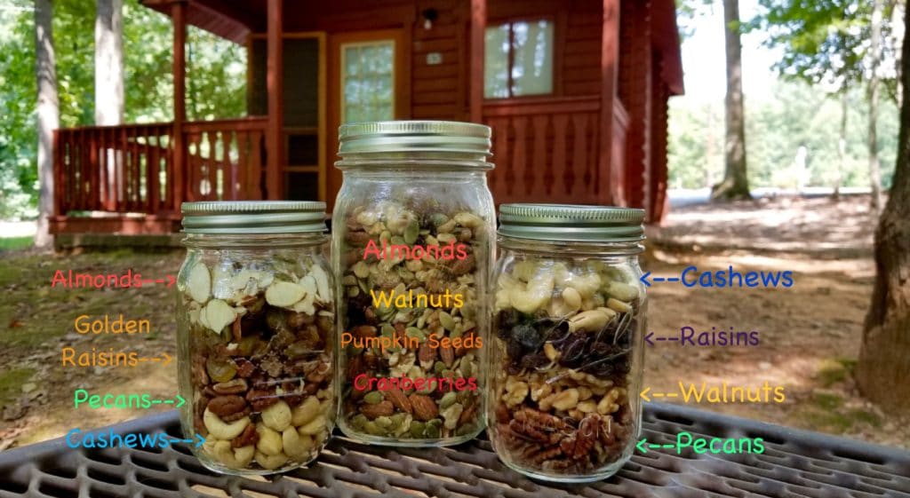 paleo trail mix in jars with listed ingredients
