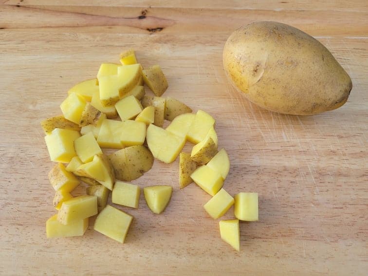 diced potato on a cutting board
