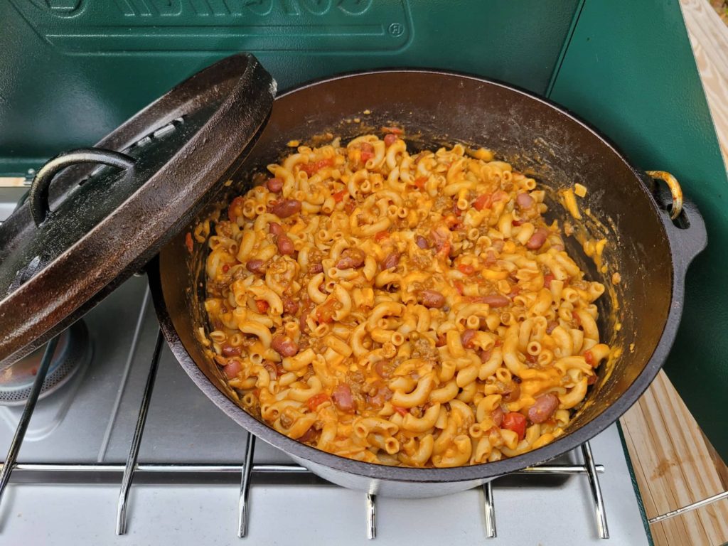 Cooked chili mac with cheese in a dutch oven 