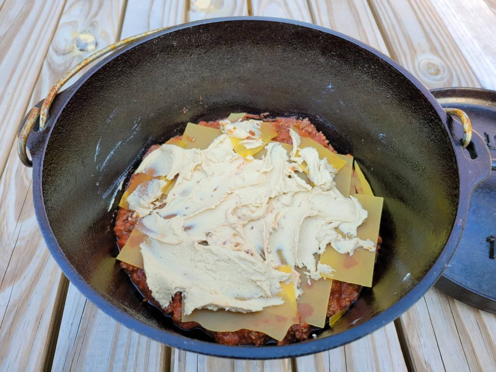 assembling dutch oven lasagna