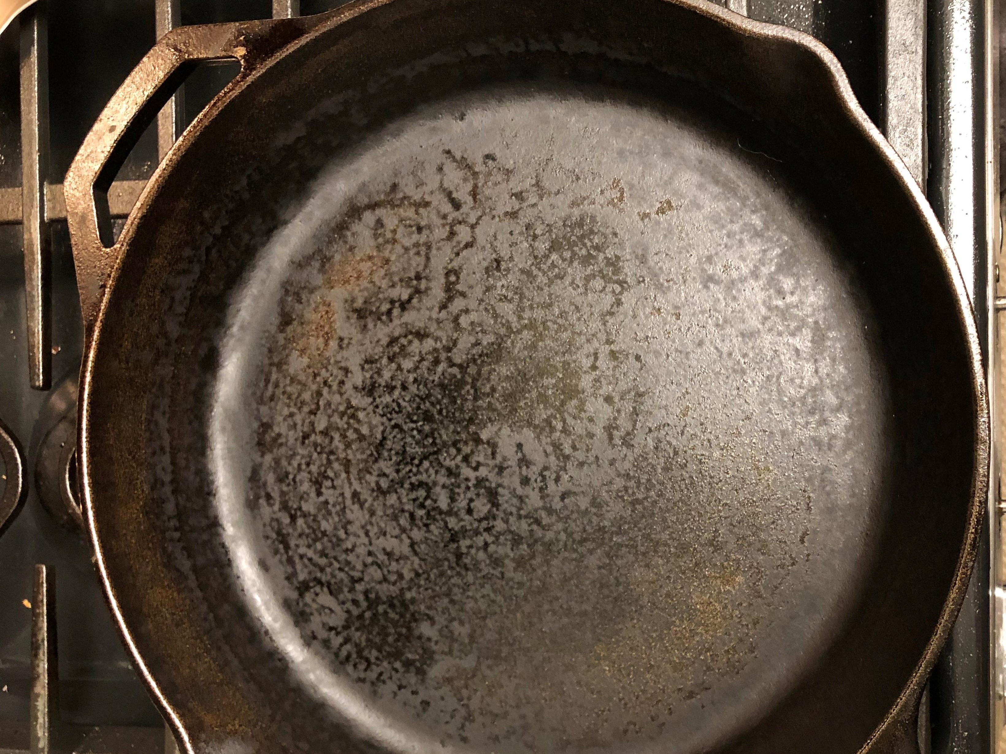 cast iron skillet #2 with uneven, splotchy seasoning