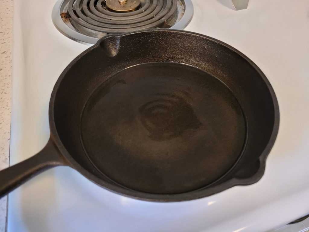 oil rippling in a hot pan ready for cooking