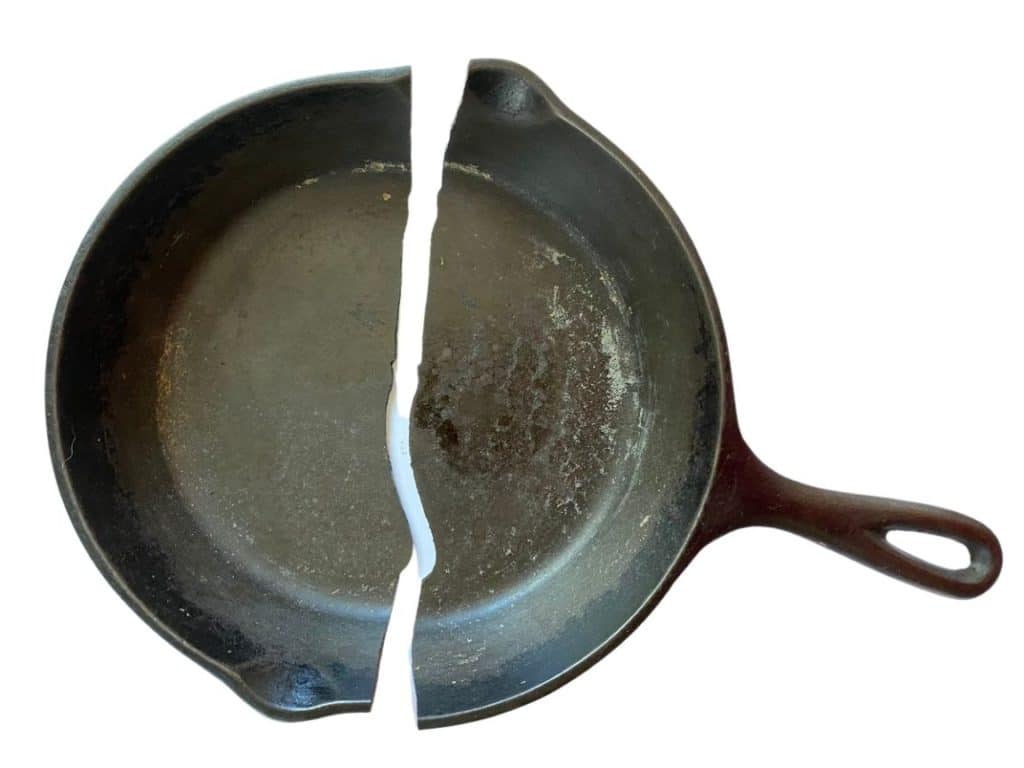 cracked, broken cast iron pan